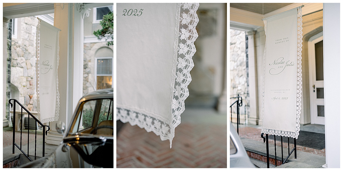 fabric welcome wedding sign with lace details hanging and blowing in a light breeze