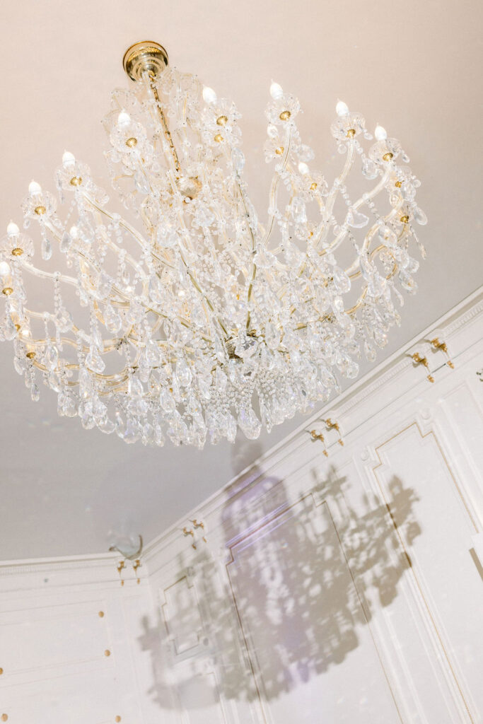 Tupper Manor Wedding | Newport RI Wedding Photographer Brianna Graca Weddings | Fine Art Editorial Imagery at Coastal Mansion Wedding Venues | Tupper Manor chandelier