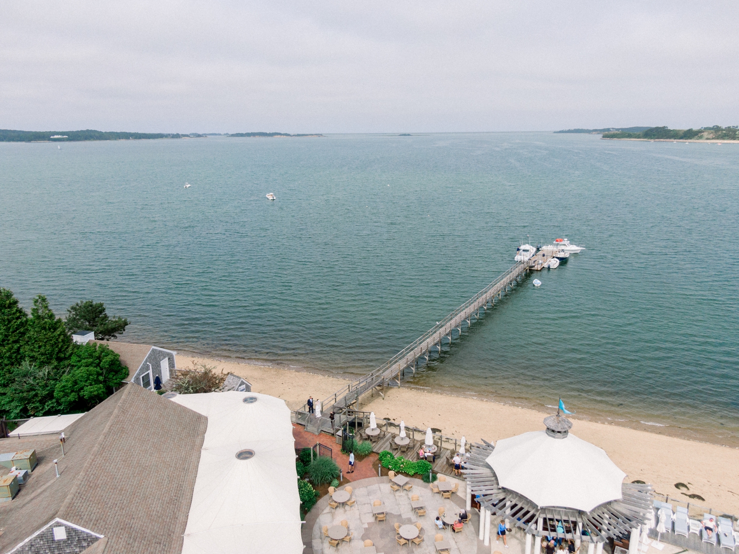 Drone photo of a wedding couple on a pier at Rhode Island Wedding