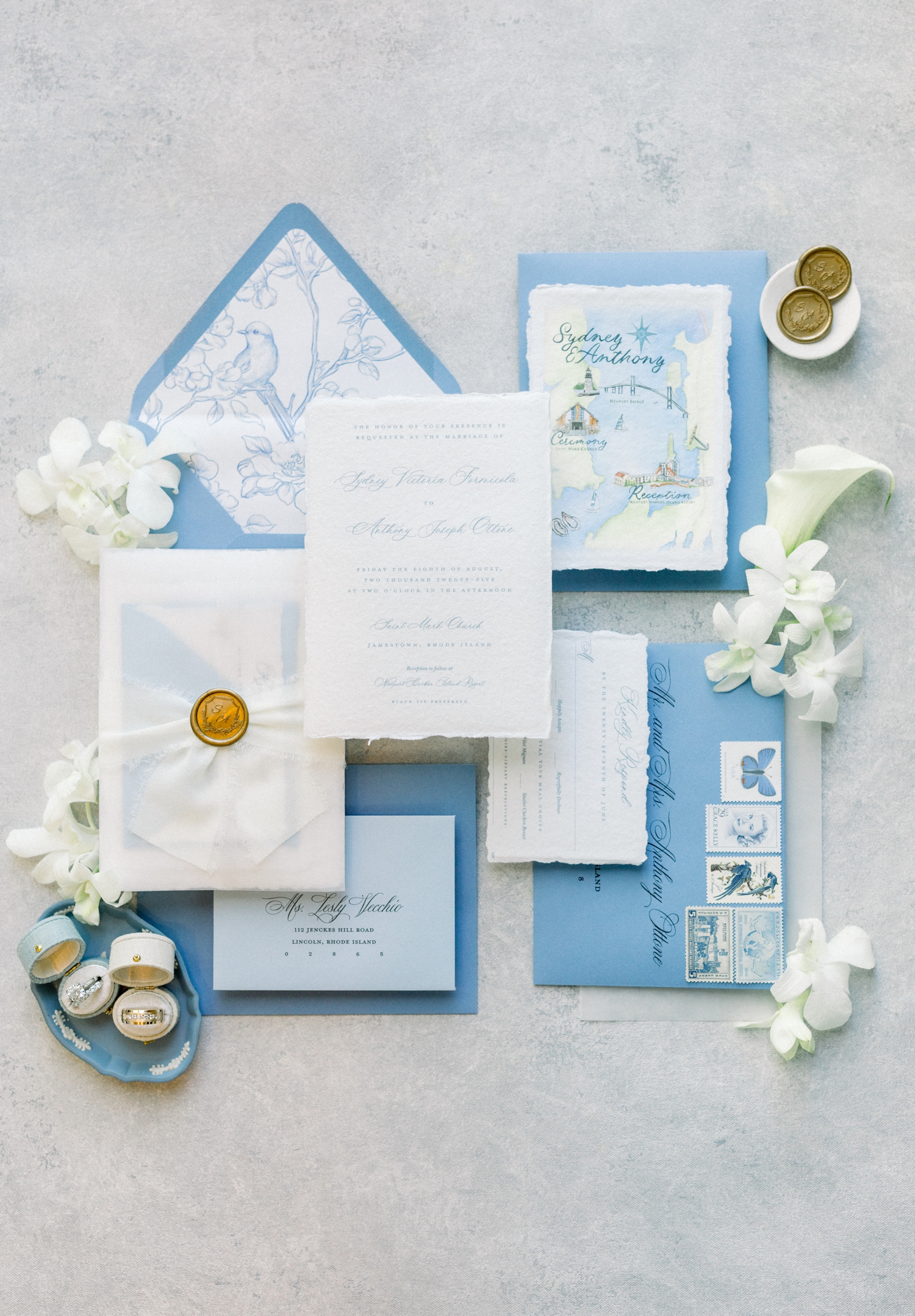 Blue and white watercolor invitation details set the tone for a Newport coastal wedding.