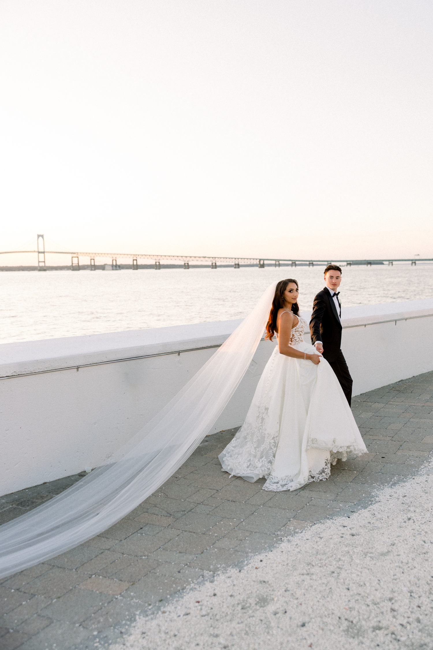 Sunset photos of bride and groom at a Newport Harbor Island Resort Wedding.